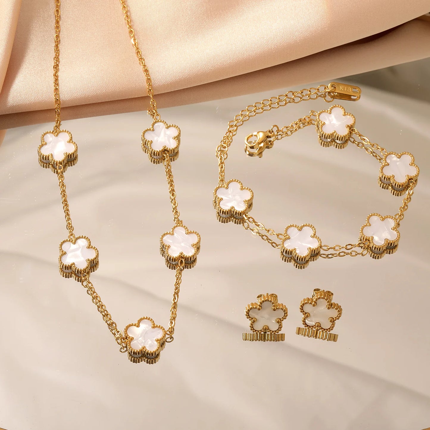 Collier/Boucles d'oreilles/Bracelet fleur